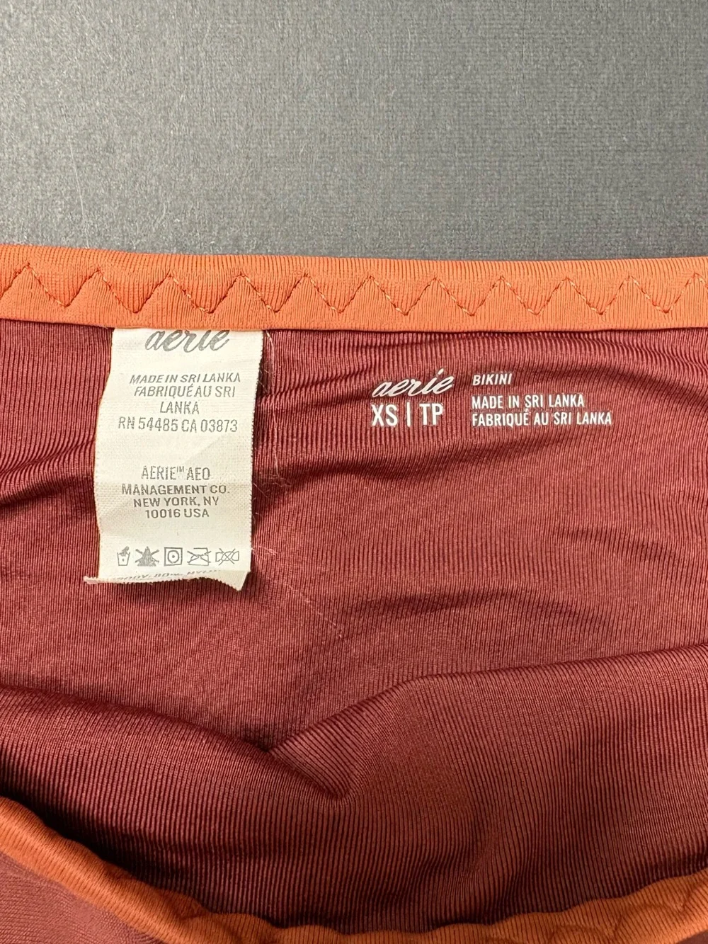 aerie Two-Piece Triangle Bikini in Rust with Peach and Orange Trim